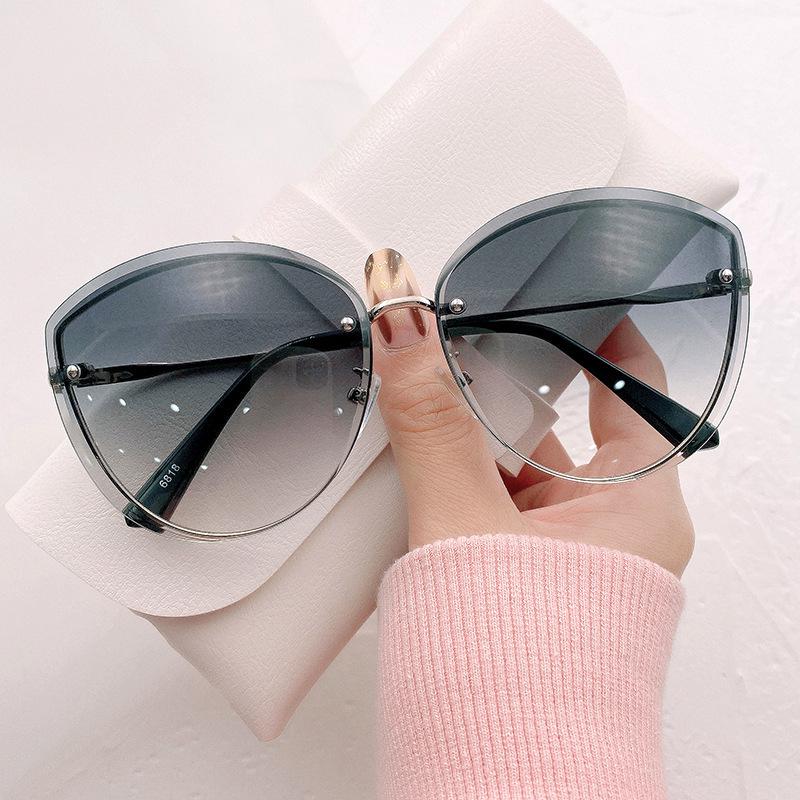Lunettes de soleil œil de chat de luxe pour femmes Surdimensionnées Semi-sans monture Verres dégradés Bordure en métal Design élégant Lunettes de soleil UV400 pour dames