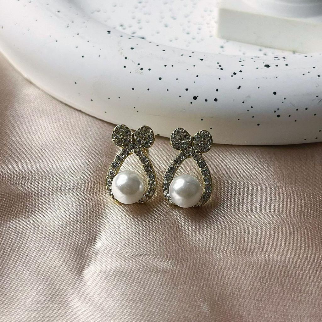 New pearl earrings women's simple temperament versatile stud earrings Douyin jewelry exquisite bow