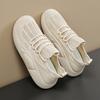 Oddychające nowe wiosenno-jesienne buty z siatki fly-woven, ażurowe, letnie, lekkie buty sportowe, miękka podeszwa