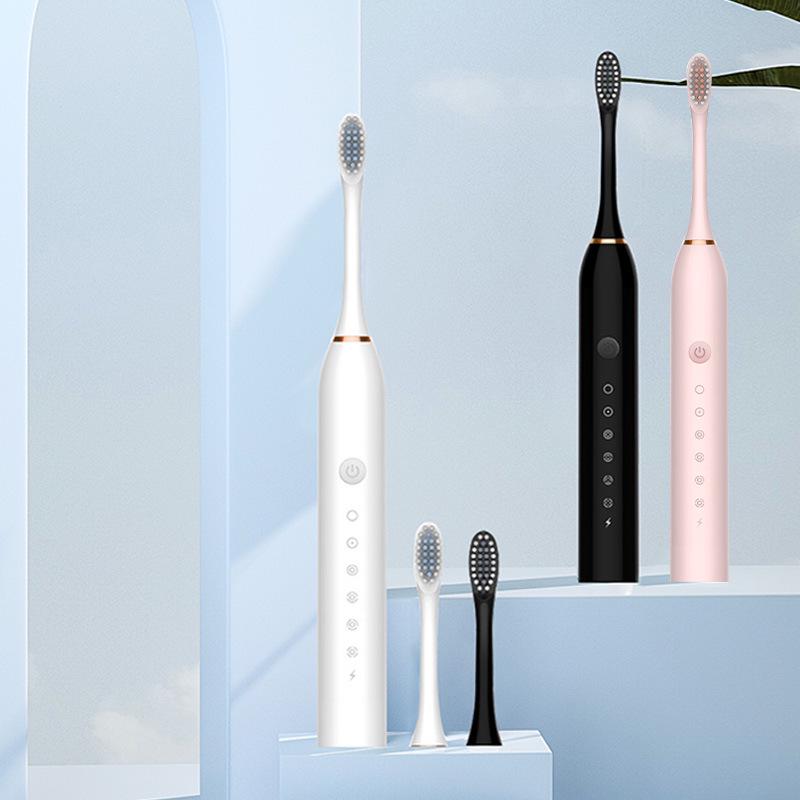 Rechargeable Electric Toothbrush with Soft Bristles, Six-Speed Vibration, Replacement Head - Ideal for Couples and Adults.