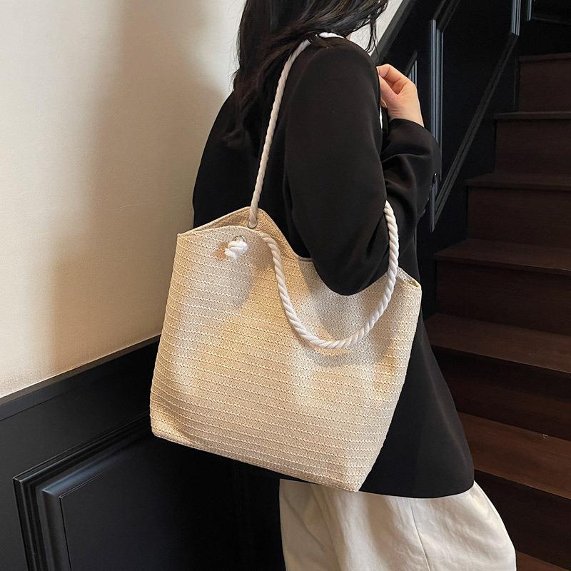 Sommer neue Farbe gestreifte Strohtasche Damen große Kapazität Temperament einfache Umhängetasche Urlaub Freizeit Strandtasche