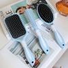 Brosse à cheveux pneumatique élastique: Idéal pour coiffer les cheveux lisses ou bouclés
