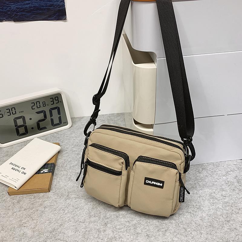 Vielseitige Umhängetasche Damen Freizeit neue einfache Schultertasche Vielseitige leichte Sport Handy-Tasche