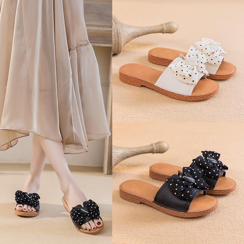 Soft bottom large size summer wear 2025 new bow flat bottom one word women's fashion beach first layer cowhide cool slippers