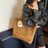 Casual large-capacity canvas bag women's 2025 new lightweight niche commuter shoulder bag graffiti portable tote bag