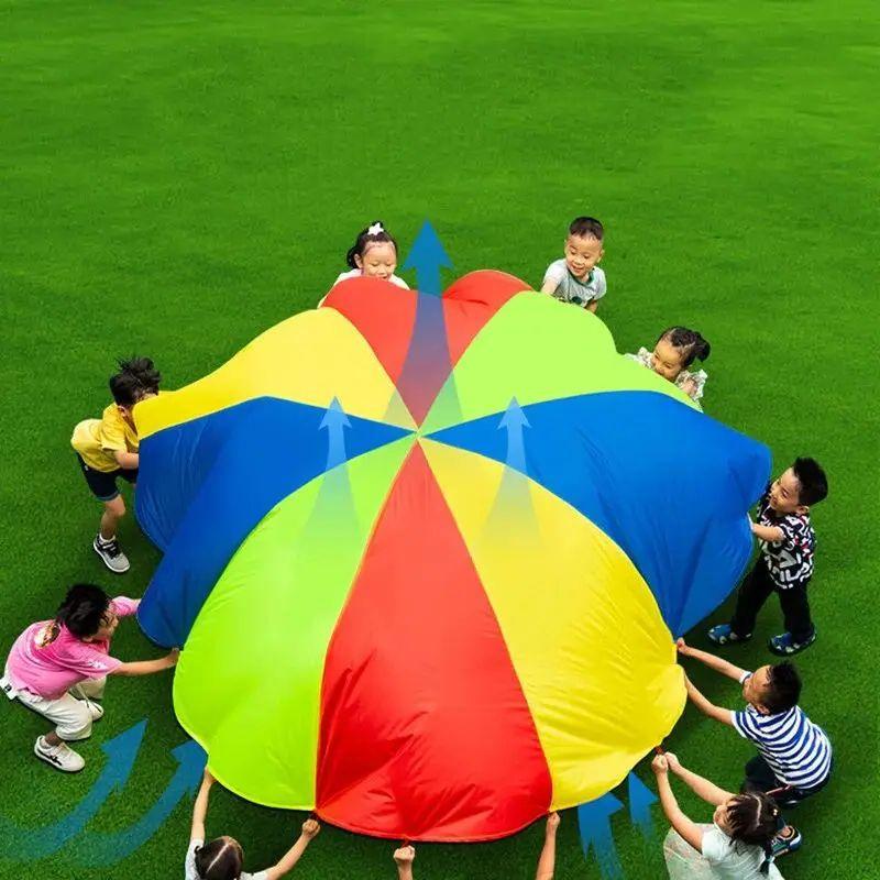 2M/6M Durchmesser Kinder Outdoor Teamspiel Requisit Regenbogen Fallschirm Spielzeug Sprungbeutel Hüpfbodenmatte Schule Mehrspieler Spiel