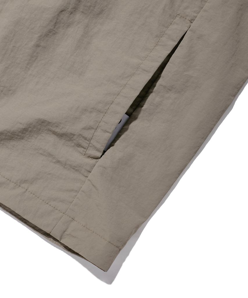 Slit Studio Lettering Windbreaker Jacket Brown