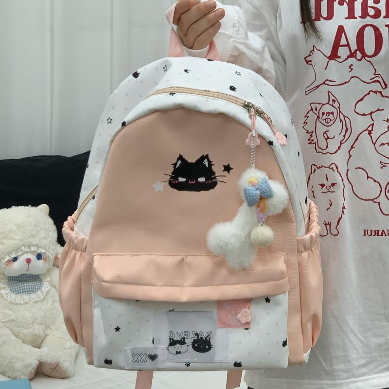 Schoolbag New cat backpack High value cartoon casual backpack Stylish and simple junior high school large capacity commuting schoolbag