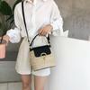 Neue gewebte Eimer-Tasche im koreanischen Stil, vielseitige Handtasche mit Umhängegurt für Damen für Strandurlaub und tägliche Reisen