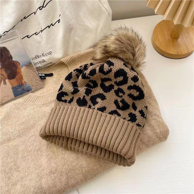 Authorized, Autumn and Winter Versatile Leopard Print Hairball Hat Fashionable Warm Crimped Knitted Hat