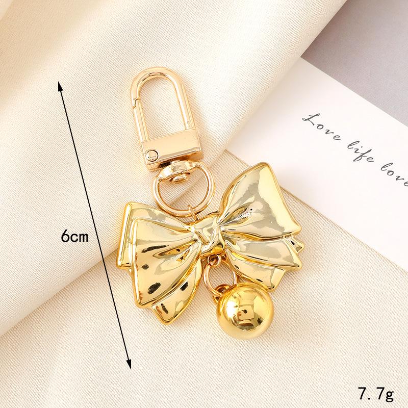 Creatieve Parel Strik Hanger Sleutelhanger: Prachtig Cadeau Accessoire voor Tas of Telefoonhoesje