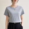 Einfarbige rechte Schulter schlankes Rundhals-Baumwoll-Kurzarm-T-Shirt für Frauen 2024 Frühjahr und Sommer neuer Stil Temperament-Innenpullover-Oberteil