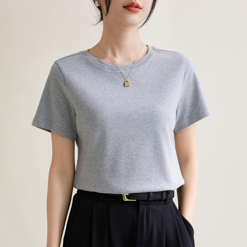 Einfarbige rechte Schulter schlankes Rundhals-Baumwoll-Kurzarm-T-Shirt für Frauen 2024 Frühjahr und Sommer neuer Stil Temperament-Innenpullover-Oberteil