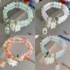 Sött grönt kristallpärlarmband för kvinnor Trendigt berlockarmband med liljekonvaljblomma Elastiskt justerbart armband Bröllopsfödelsedagsmycken