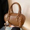 Niche design retro Maillard draagbare kleine tas dames 2025 nieuwe Koreaanse mode getextureerde schouder crossbody tas