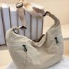 Sac à bandoulière décontracté Macron en nylon imperméable, sac bandoulière de niche rétro pour navetteur, sac dumpling