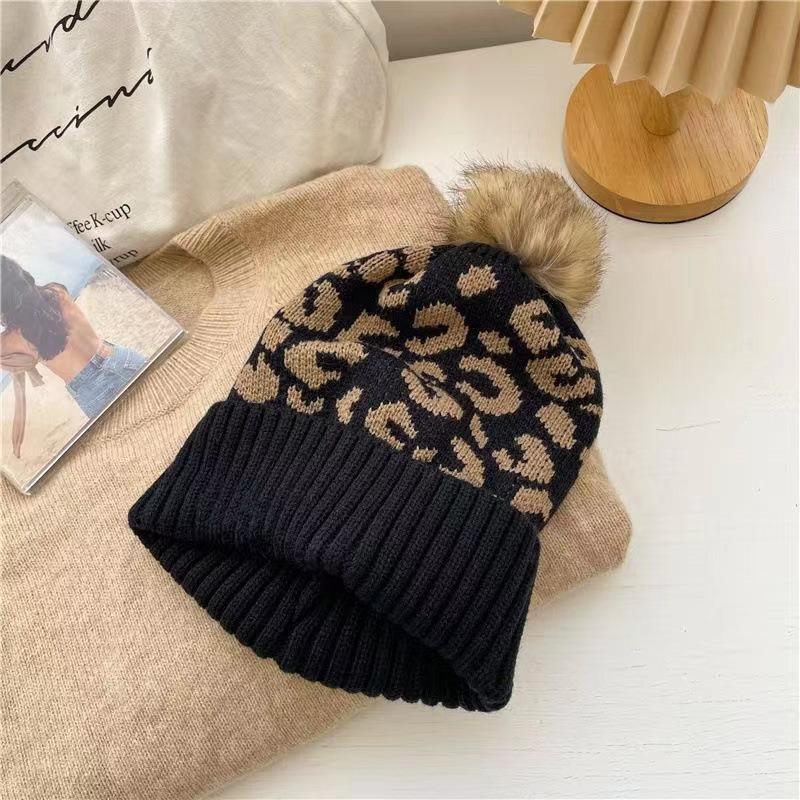 Authorized, Autumn and Winter Versatile Leopard Print Hairball Hat Fashionable Warm Crimped Knitted Hat