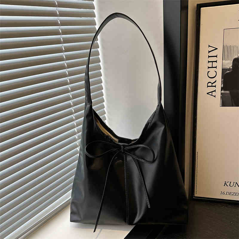 Sac à bandoulière grande capacité pour femme automne hiver rétro polyvalent avec nœud cuir PU sac de shopping et de déplacement