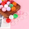 100 Stück leere Spielzeug-Automatenkapseln aus Kunststoff, halb transparent, halbfarbig, runde Kugel