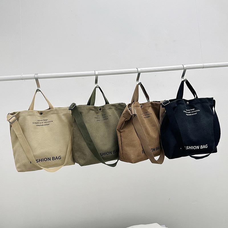Lässige Handtasche mit großem Fassungsvermögen Neue modische und einfache lässige Canvas-Tragetasche College-Studenten-Klassentasche