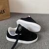 Nouvelles chaussures de skateboard rétro noires de niche pour le printemps, nouvelles chaussures décontractées pour la photographie de rue chinoise, étudiants