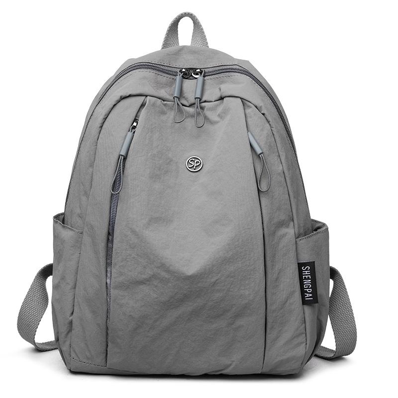 Zaino da viaggio leggero, grande capacità, multi-tasca, zaino unisex impermeabile