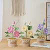 Handstickade virkade blommor i kruka Realistiska konstgjorda blommor Snöflinga garn Morgonröd stickad blomma Skrivbordsdekoration