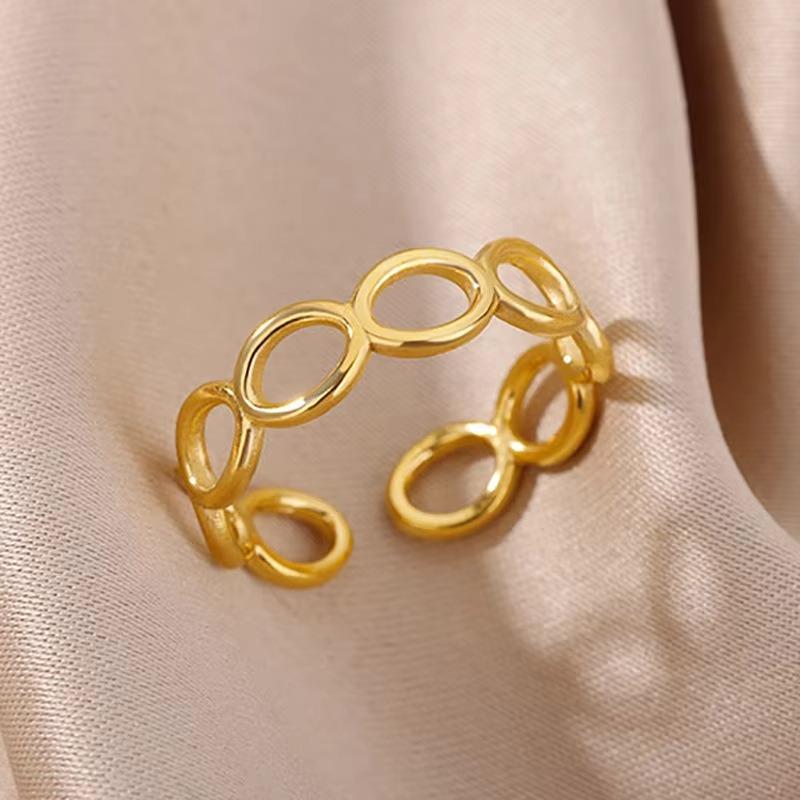 Vind Hål Blomma Sol Titanstål K Guld Ring Dam Hip Hop Nisch Öppen Pekfinger Ring Ny