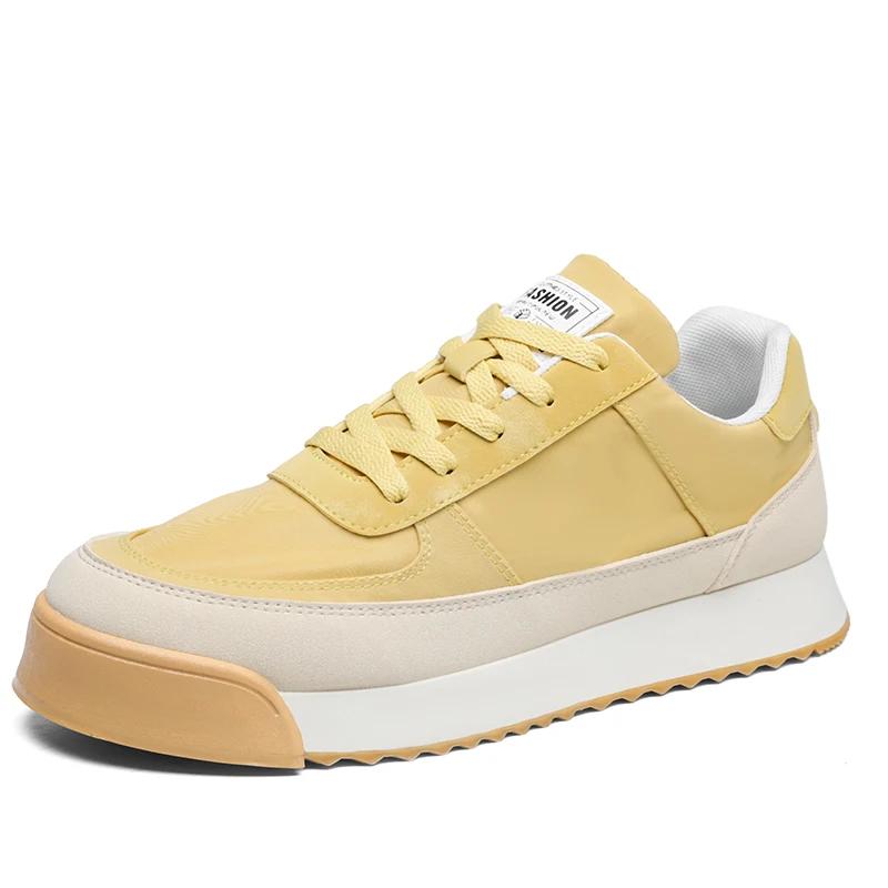Moda SYTK 2025 nueva primavera zapatillas de lona de caña baja con cordones antideslizantes moda todo tendencia zapatos universitarios para hombre zapatos casuales deportivos