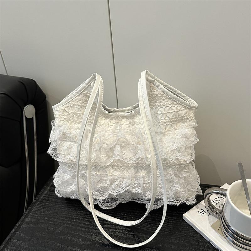Sac fourre-tout design de niche été loisirs vacances dentelle de fée maille sous le bras épaule portable sac pour femmes grande capacité