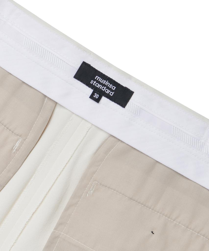 Musinsa Standard Lightweight Relaxed Tapered Hidden Banding Crop Slacks [Cream]