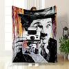 A recursive pattern of a person holding a camera displaying itself. for all seasons blanket lunch break throw gift
