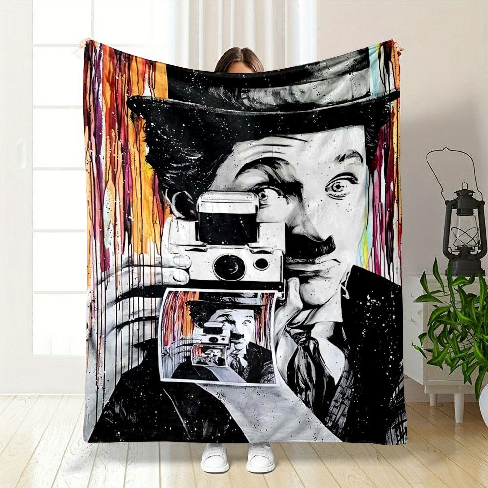 A recursive pattern of a person holding a camera displaying itself. for all seasons blanket lunch break throw gift