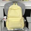 Schoolbag schoolbag female college student Korean version ins large capacity simple solid color backpack junior high school student backpack boys and 