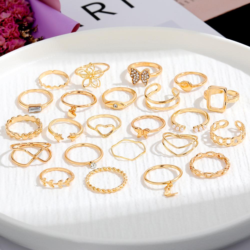 2023 Vintage Hohl-out Ring Luxus Schmetterling Blume Ring Stern Einfache Schmuck Zubehör Ring Liebe Frauen Party Vielseitig 23 stück Set Ring