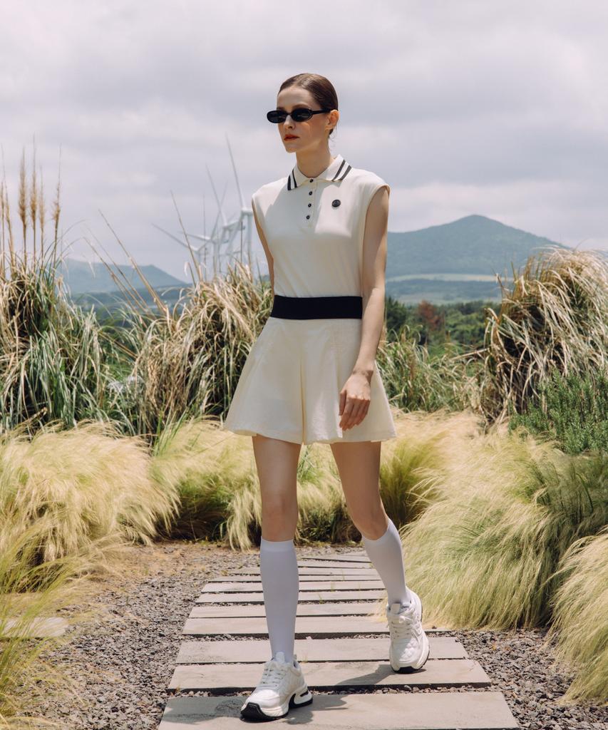 Over Golf Air Move Pleated Skirt (Cream)