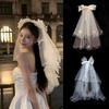 Vintage Style Short White Bow Tulle Bridal Veil with Hair Clip Elegant Wedding Headwear for Retro Themed Wedding Party Shoot