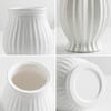 Vase artistique en céramique à rayures blanches pour salon, composition florale, sensation avancée, petites fleurs séchées, décoration de la maison