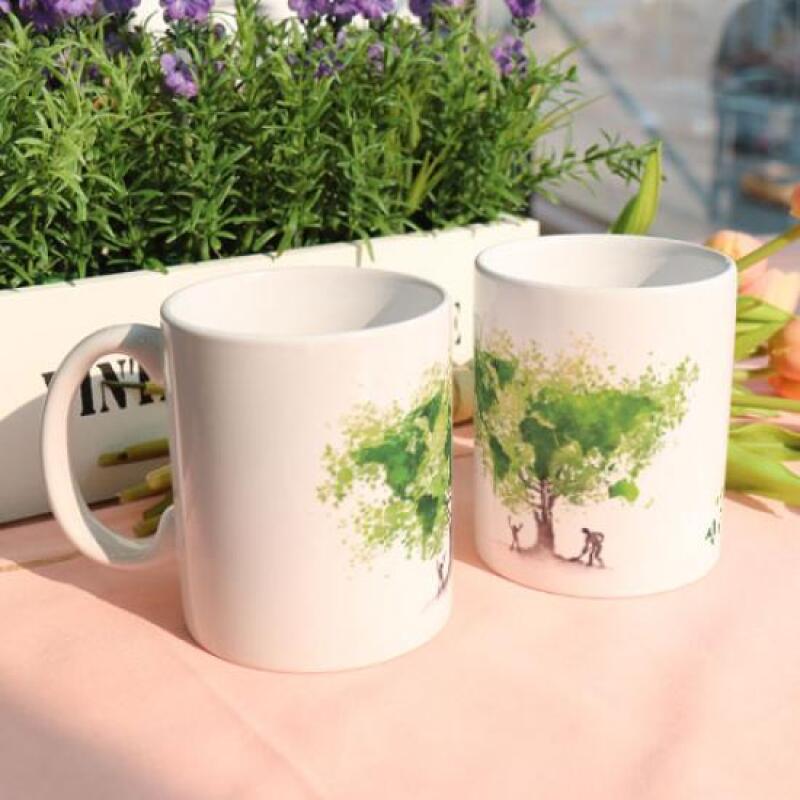 Ad652-Designbecher 2p-Bäume pflanzen für die Erde