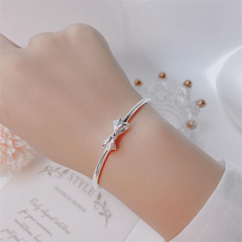Bracelet Princesse Fugitive Très Vendu Haut de Gamme Luxe Léger Design de Niche Clochette Nœud Bijoux en Argent pour Femmes