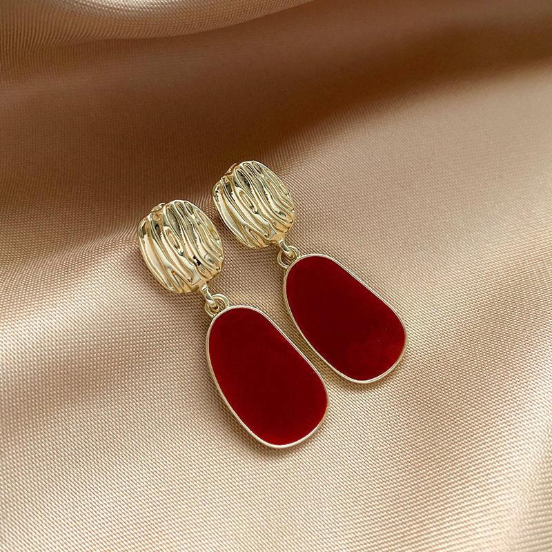 Maillard koffiekleurige amber oorbellen dames herfst en winter high-end pendelstijl oorbellen lichte luxe niche design oorbellen