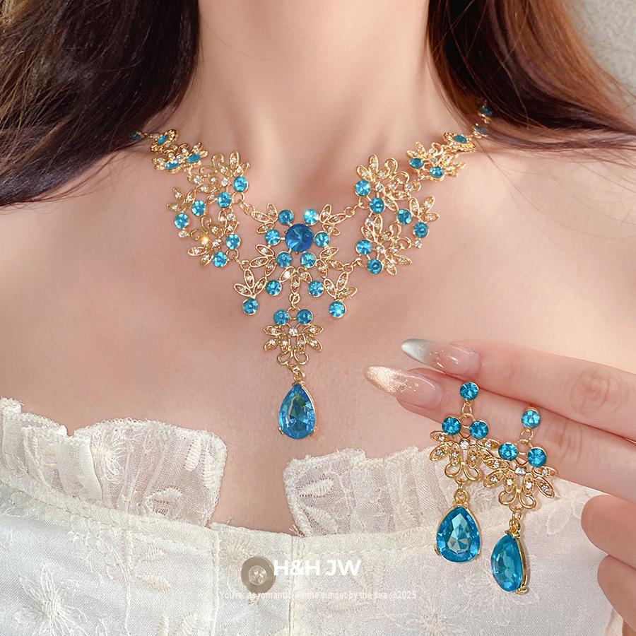 European and American diamond-encrusted flower hollow water drop pendant earrings light luxury high-end bracelet court style elegant and exquisite set