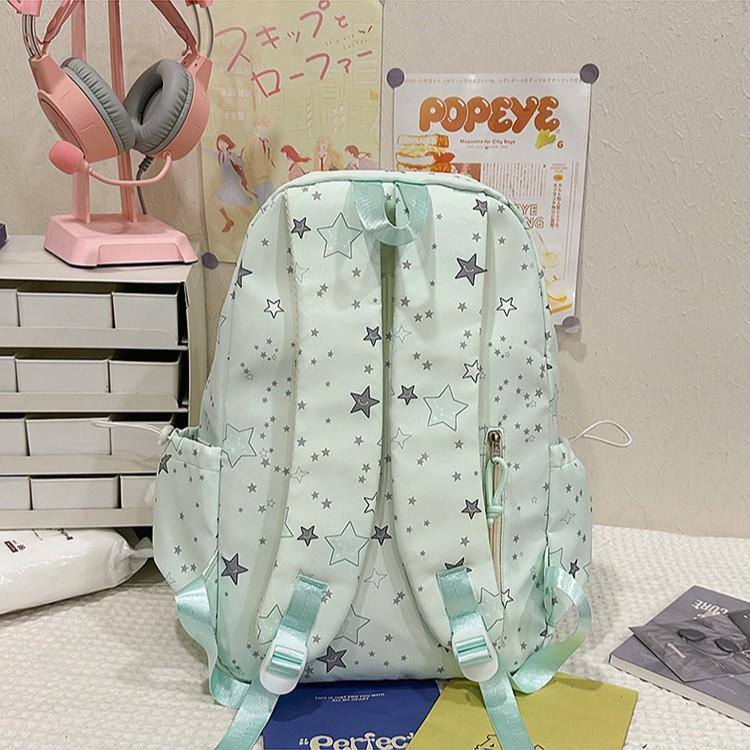 Schoolbag schoolbag female junior high school high school student star printing Korean version niche ins backpack Mori students large capacity 