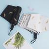 Compact UV Protection Umbrella: Portable Parasol for Sun and Rain, Stylish Black Feather Design, Korean-Inspired Fresh Look.