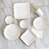 Eco-friendly Children's Birthday Party Tableware Set: White Disposable Plates, Cups, and Napkins.