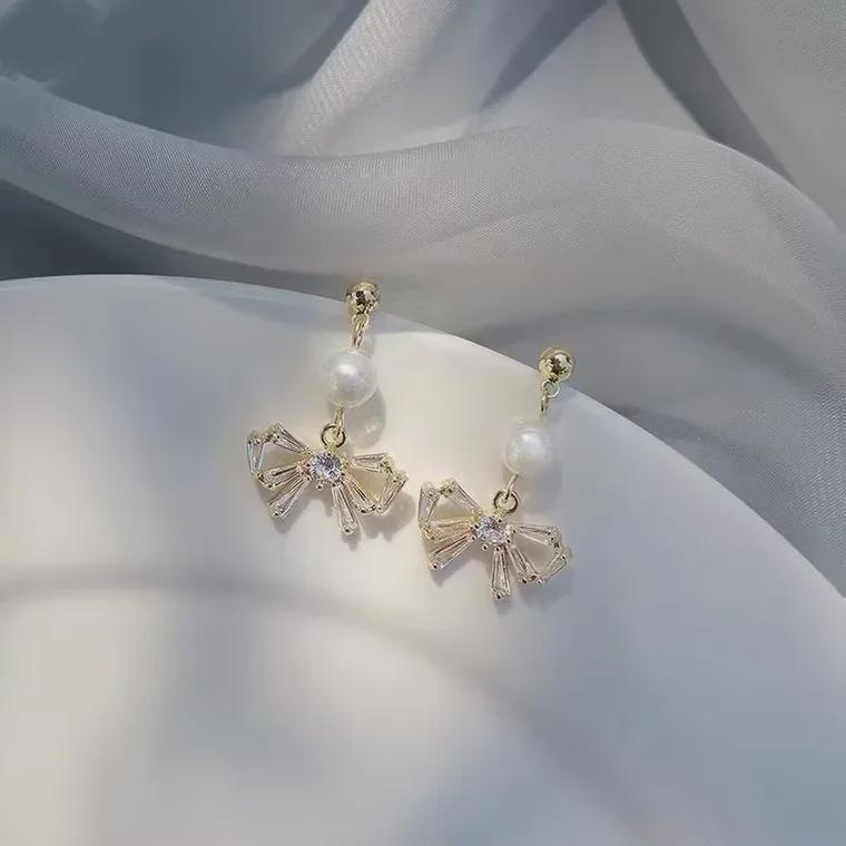 Korean Pearl Bow Clip-On Earrings - Elegant & Versatile Design