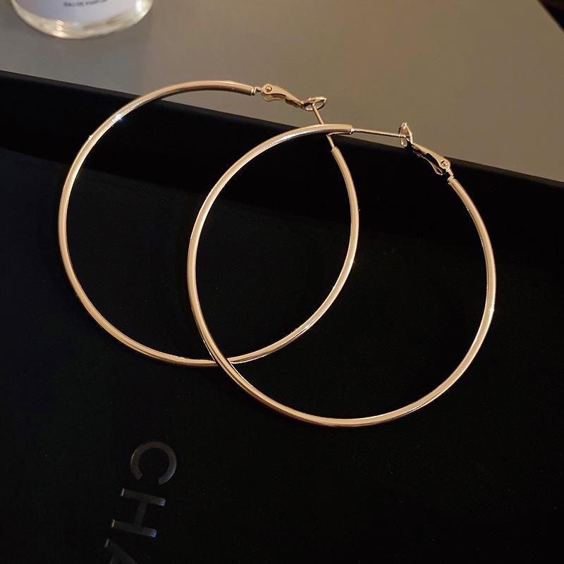 Silver Needle Style Circle Earrings - Simple Korean Metal Design, All-Match Earrings for a Celebrity Look.