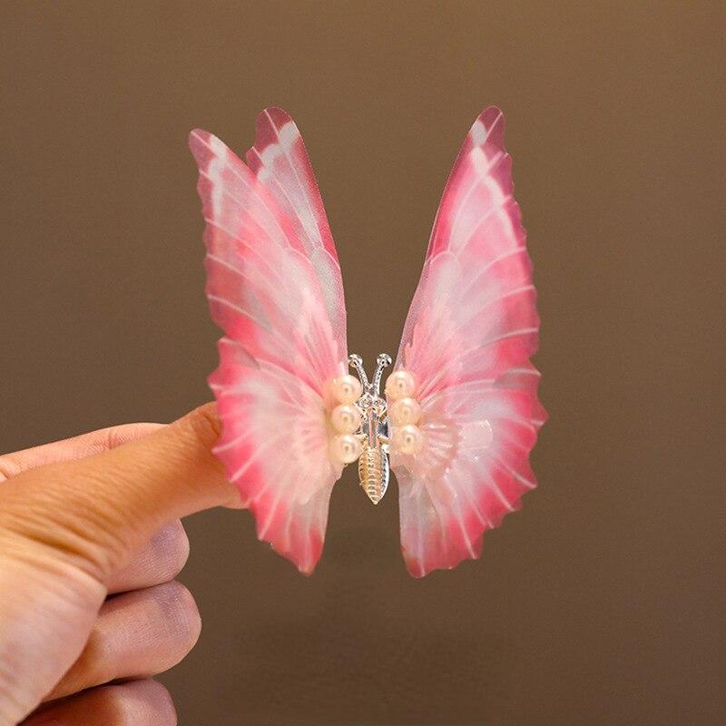 Koreanska Moving Butterfly Hårklämmor för flickor Dubbellagers vingar Pearl Hårklämmor Huvudbonader Flickor Barn Håraccessoarer