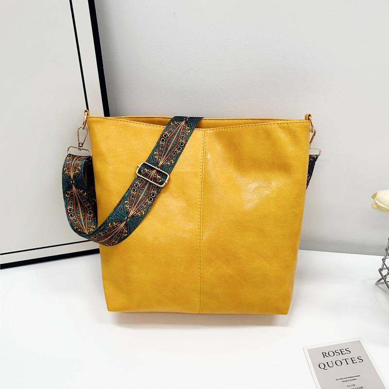 Große Kapazität Tasche Damen Frühling und Sommer Neu Retro Breitband Schulter Umhängetasche Premium Textur Pendler Beuteltasche