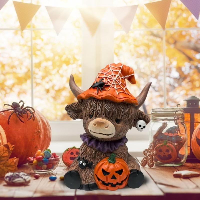Highland Cow Holding Skull Pumpkin Statue Unique Holiday Gift Handcrafted Resin Figurine Halloween Tabletop Display